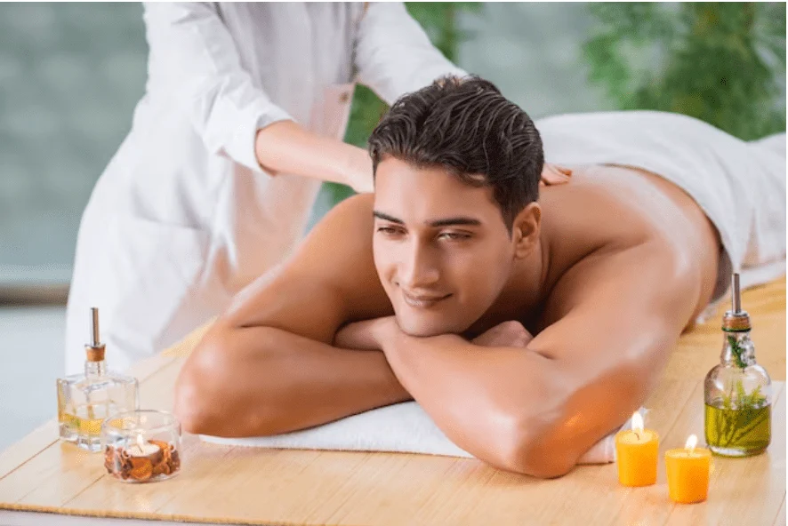 happy man recieving a massage